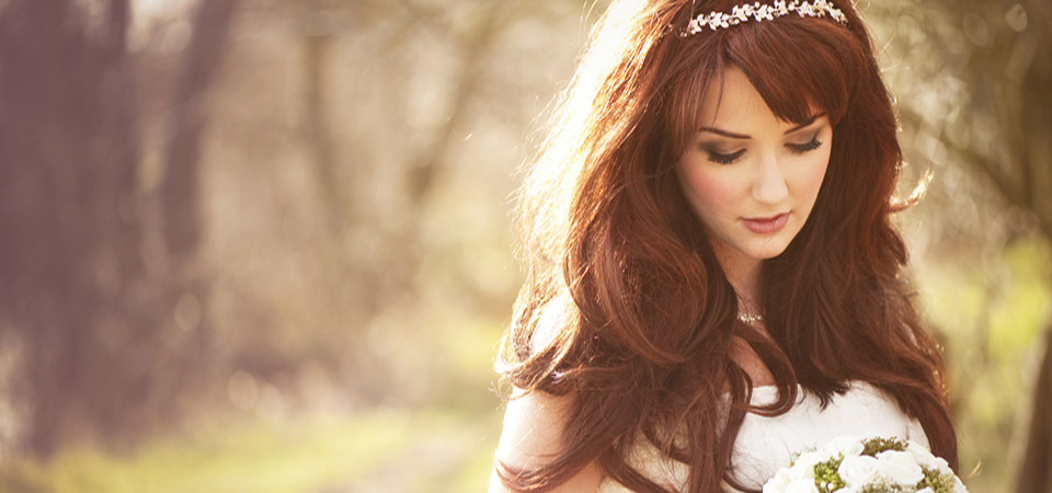 Beautiful bride outdoors in a forest.